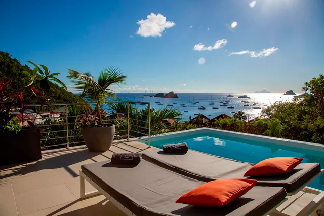 terrace pool chairs ocean view at Villa Aka in St Barts - St Barts luxury vacation rental