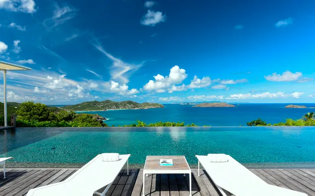 03 - Hill House pool chairs ocean view at Villa Hill House in St Barts - St Barts luxury vacation rental