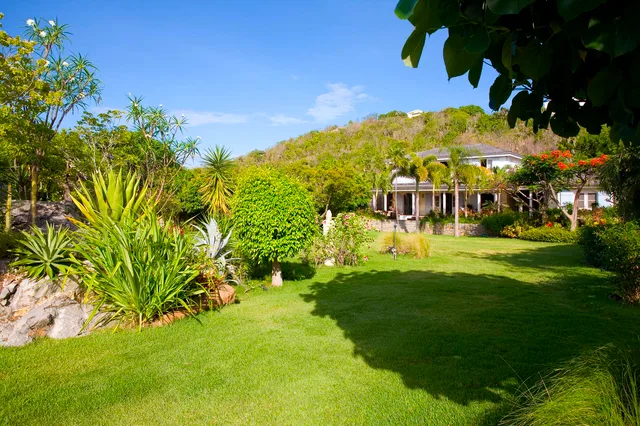 Manoir de Lurin garden and grass house view at Villa Le Manoir de Lurin in St Barts - St. Barts Villa Rental