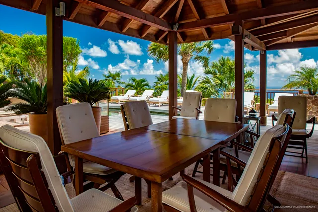 covered terrace table at Villa Nahma in St Barts - St. Barth Villa Rental