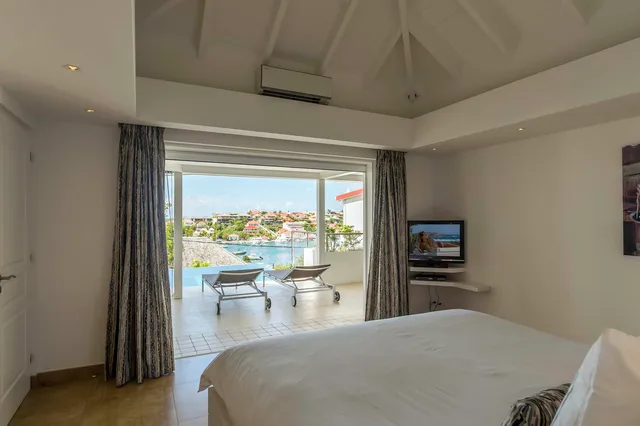 bedroom 1 harbour view - by J at Villa Wastra in St Barts - St. Barts Villa Rental